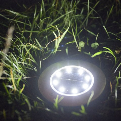 Lampy ogrodowe solarne najazdowe gruntowe czujnik zmierzchu wbijane świecący dysk 8LED 12szt. zimny biały Kik Sp. z o. o. Sp. k. Lampy ogrodowe solarne najazdowe gruntowe czujnik zmierzchu wbijane świecący dysk 8LED 12szt. zimny biały Kik Sp. z o. o. Sp. k.